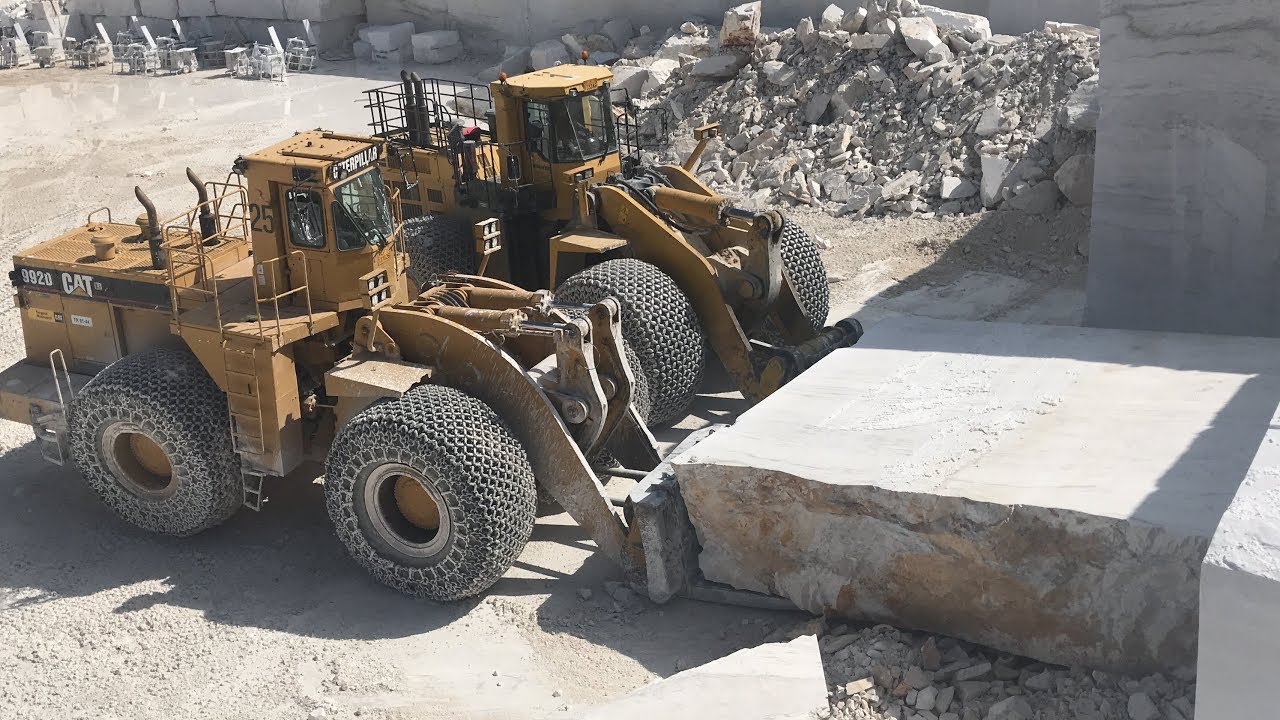 Huge Wheel Loaders Working In the Biggest Marble Quarry