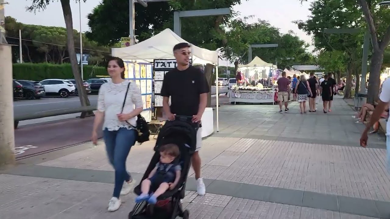 Walk Tour through street market in Santa Susanna Promenade by night Summer 2024