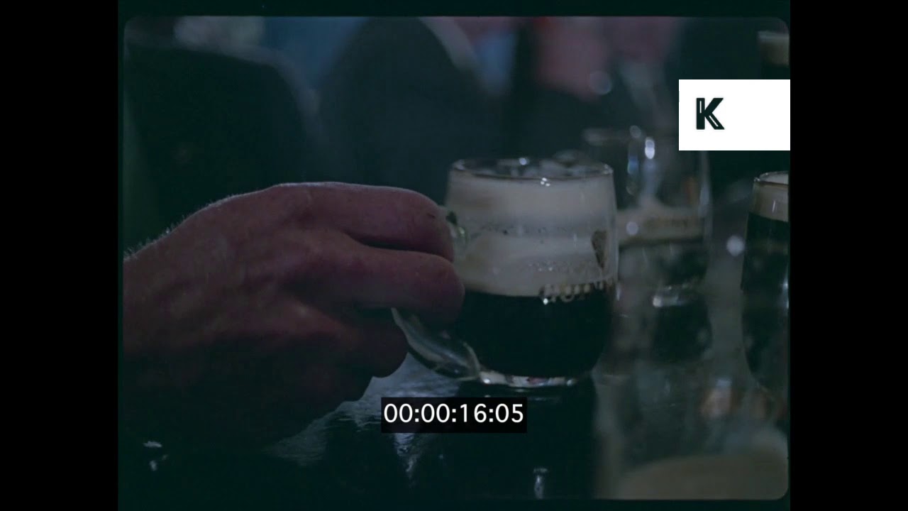 1960s UK, Men Drinking Pints of Guinness, Pub, 35mm