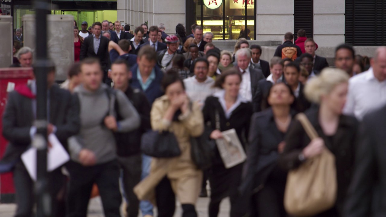 Commuters on a busy street in London