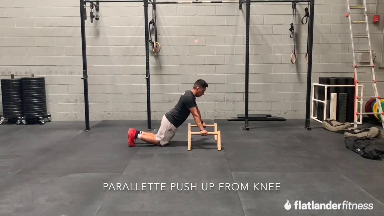Parallette push up demo. (Toes/knees)