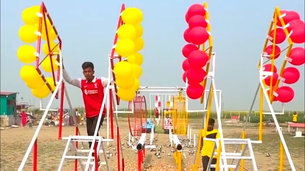 Organized a wonderful competition in the funny game of bursting the tires by squeezing the balloons