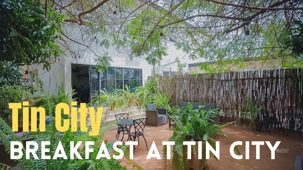 INVITED TO TIN CITY CAFE FOR BREAKFAST