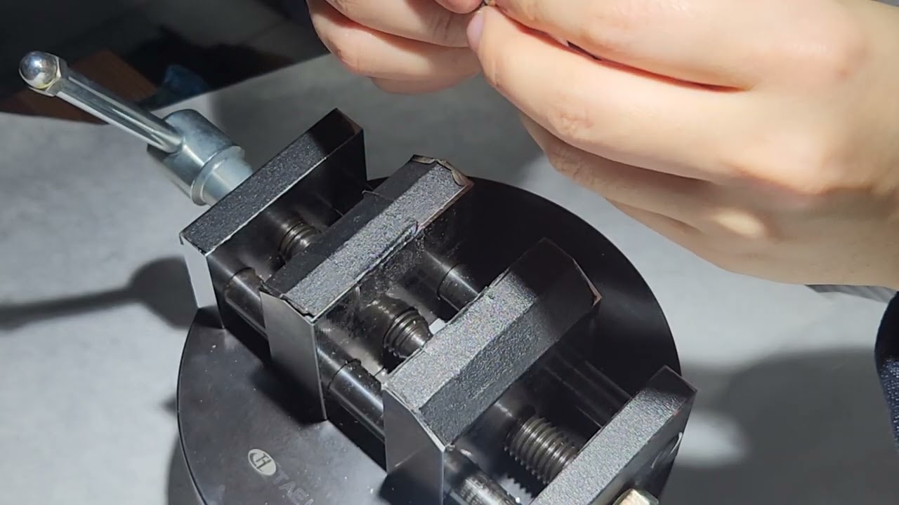 Hand engraving on a ring 