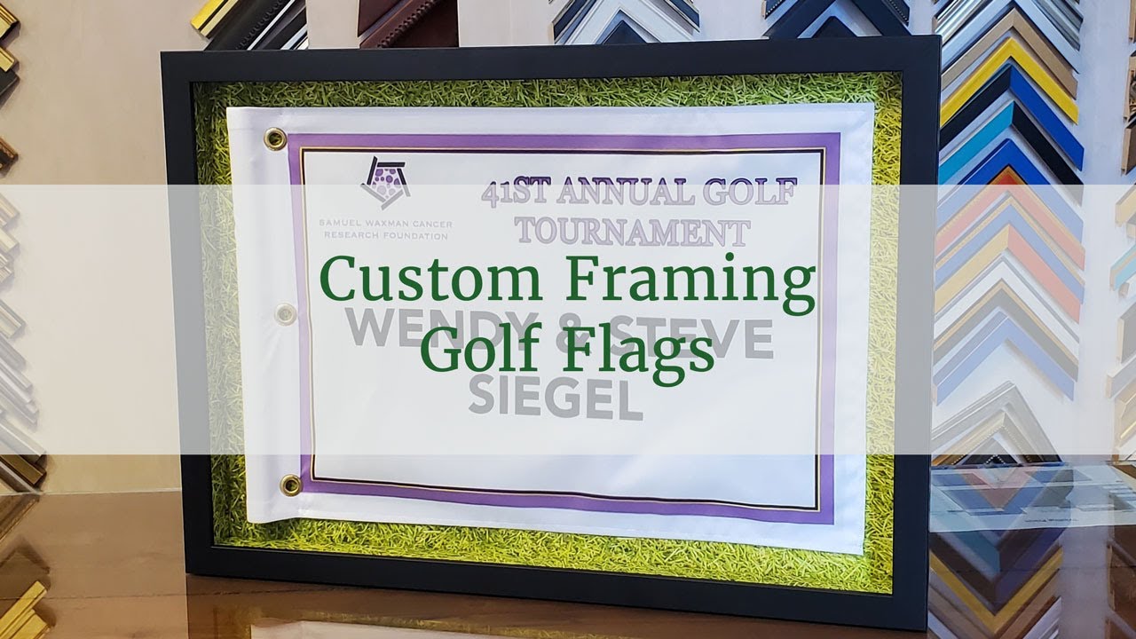 Custom Framing Golf Flag Framing in black frame and grass background