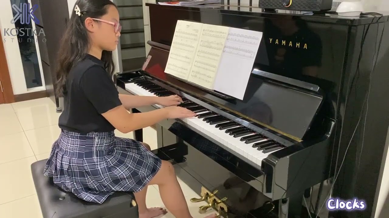 Distinction Scorer for Rockschool Grade 5 Piano -  Law Yong Hui (full clip)
