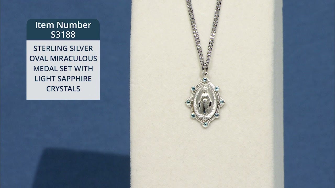 STERLING SILVER OVAL MIRACULOUS MEDAL SET WITH LIGHT SAPPHIRE CRYSTALS_S3188