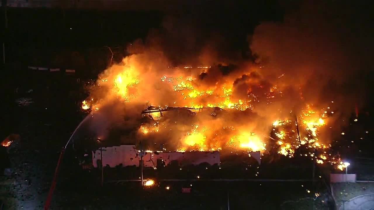 VIDEO: Crews battle massive industrial fire in Clinton Township near 15 Mile and Groesbeck