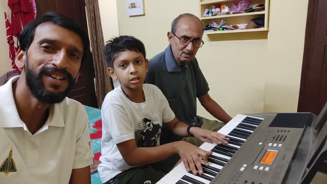 Jamming session with my Father and son 😊 Hai apna Dil to awara song... In keyboard Prathmesh 