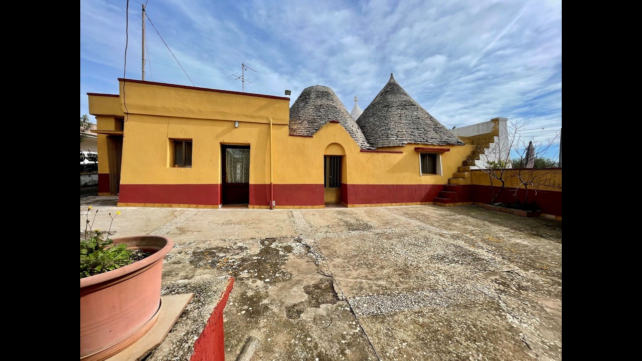 Trulli e lamie dal contesto abitato,nel cuore della Valle d' Itria