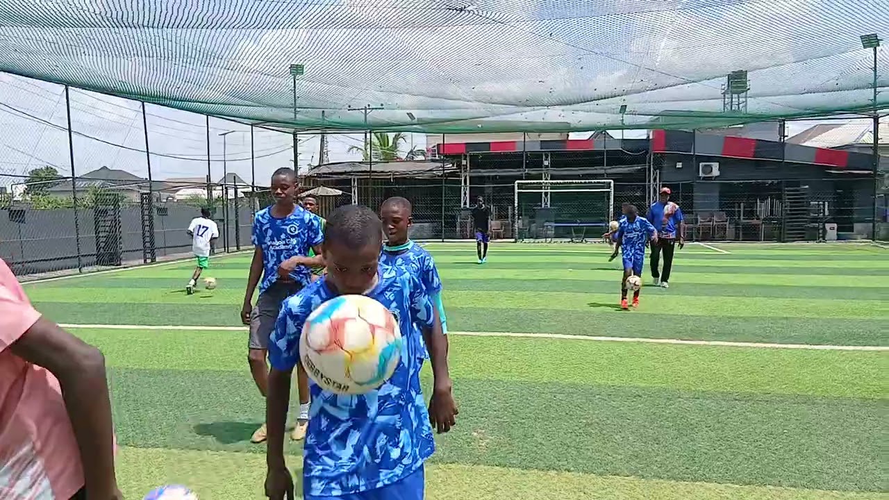 Training to improve football skills! Jogging and ball control drills are essential for any player.