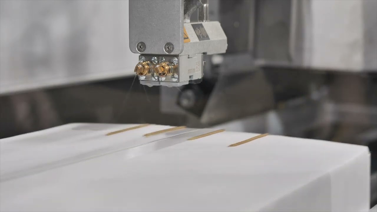 Discover Combi's High-Performing Case Stacker with Hot Melt Glue