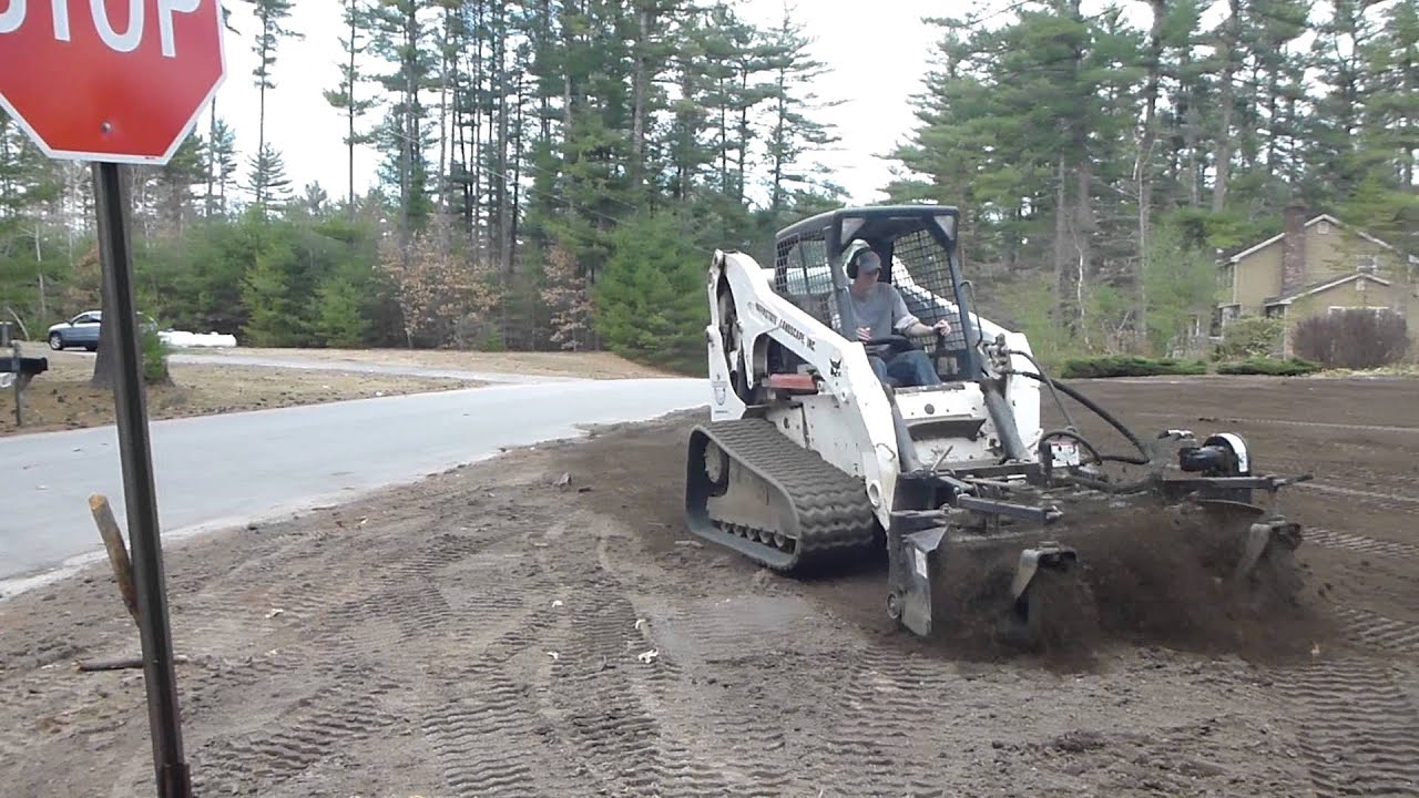 Track Loader Using Harley Rake
