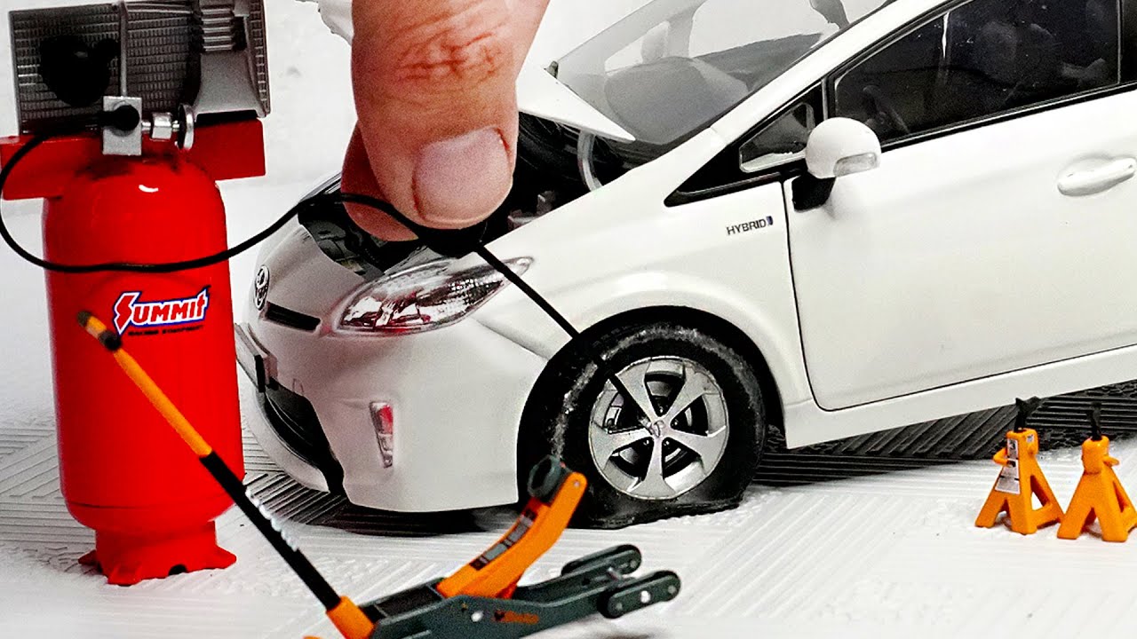 Changing Tyres of Miniature Prius Diecast Model 1:18 Scale