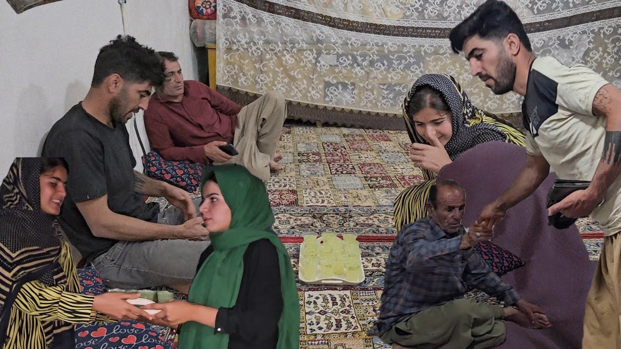 The Baru family returns from the river to their home.
