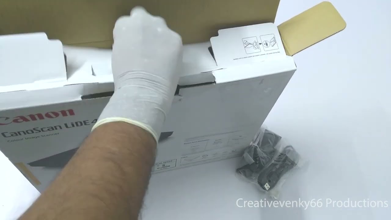Распаковка сканера Canon CanoScan LiDE 400 от Venkateshh