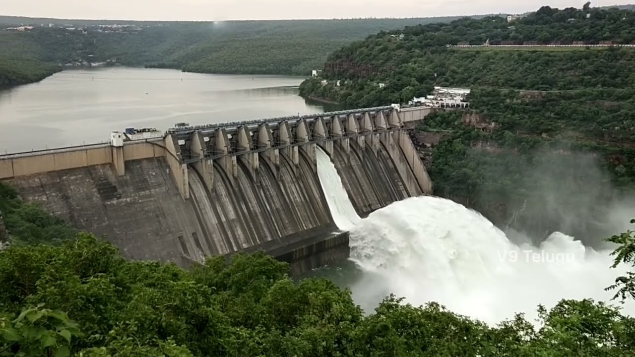 శ్రీశైలం డ్యాం గేట్లు ఎత్తివేత | Srisailam Dam Gates Open | V9 Telugu
