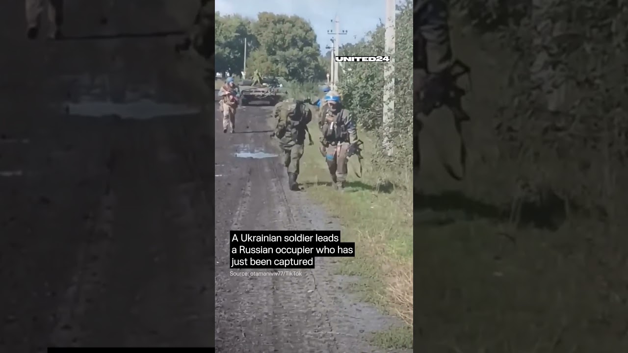 Ukrainian soldier leads a Russian occupier who has just been captured #warinukraine #united24media
