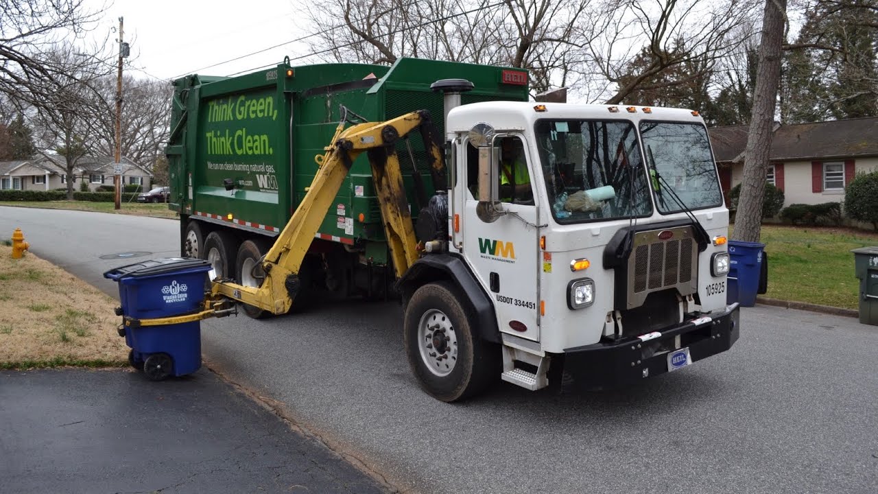 Waste Management: Heil Python Side Loader Garbage Truck.