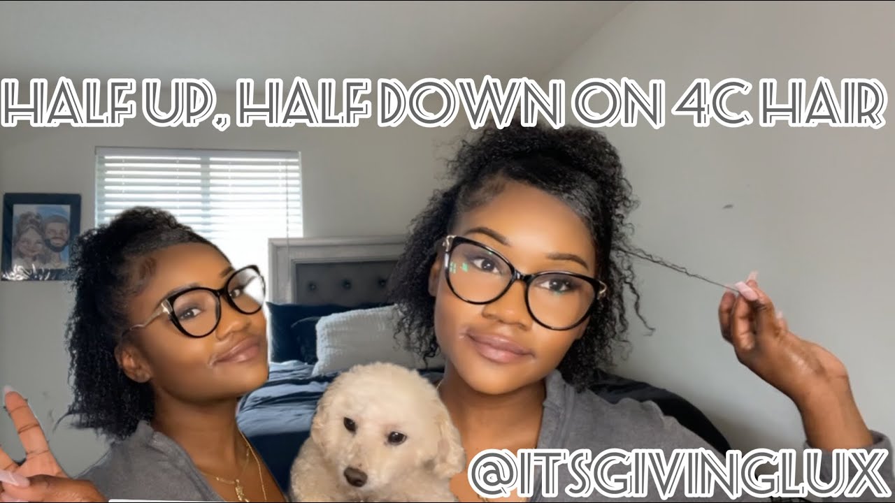 Half up, half down natural hairstyle on 4C hair with claw clip.