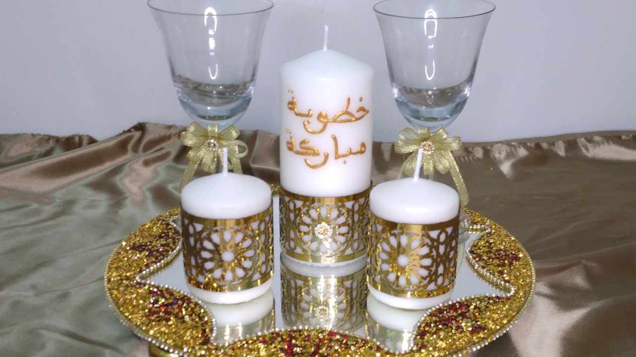 تزيين الشموع للخطوبة باك باللون الذهبي