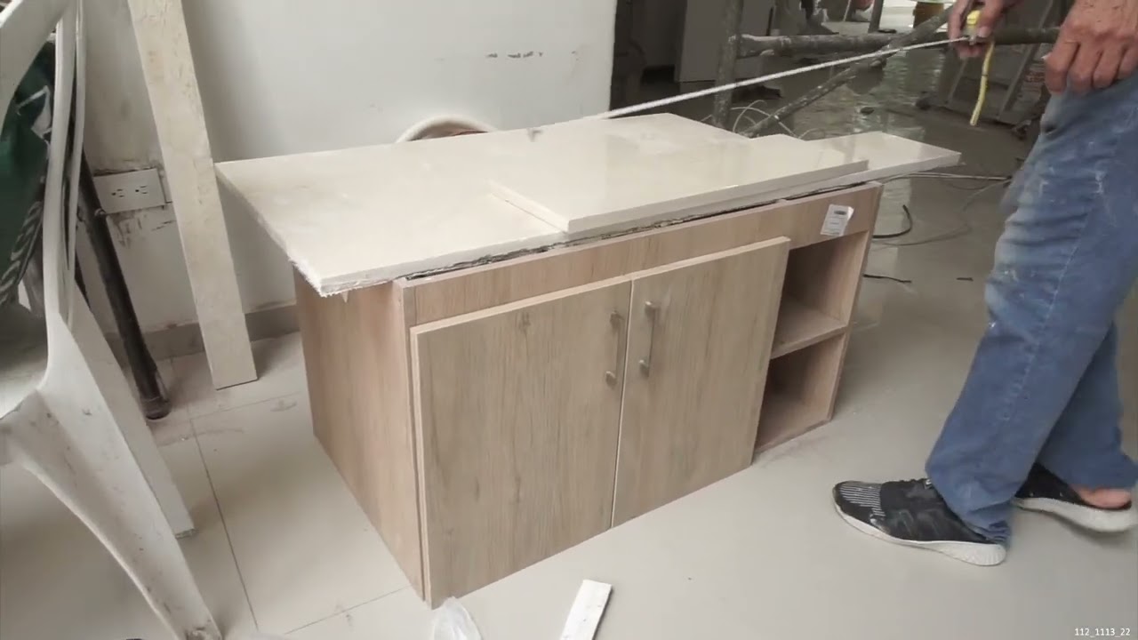 Installing Wood Cabinets and Marble Countertops in Bathroom