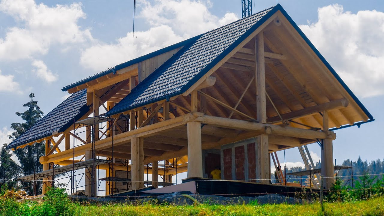 Building The Roof Of The Log Post And Beam House