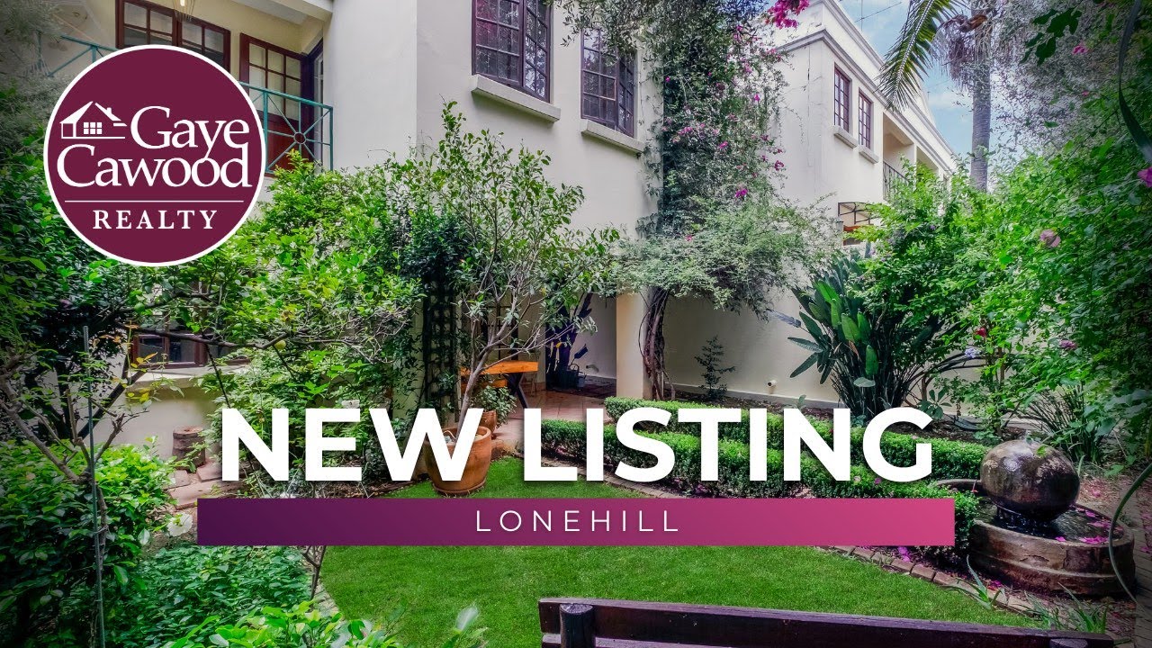 A DUPLEX SANCTUARY IN THE TREETOPS —LIVING IN LOVELY LONEHILL WILL LEAVE YOU IN ABSOLUTE AWE