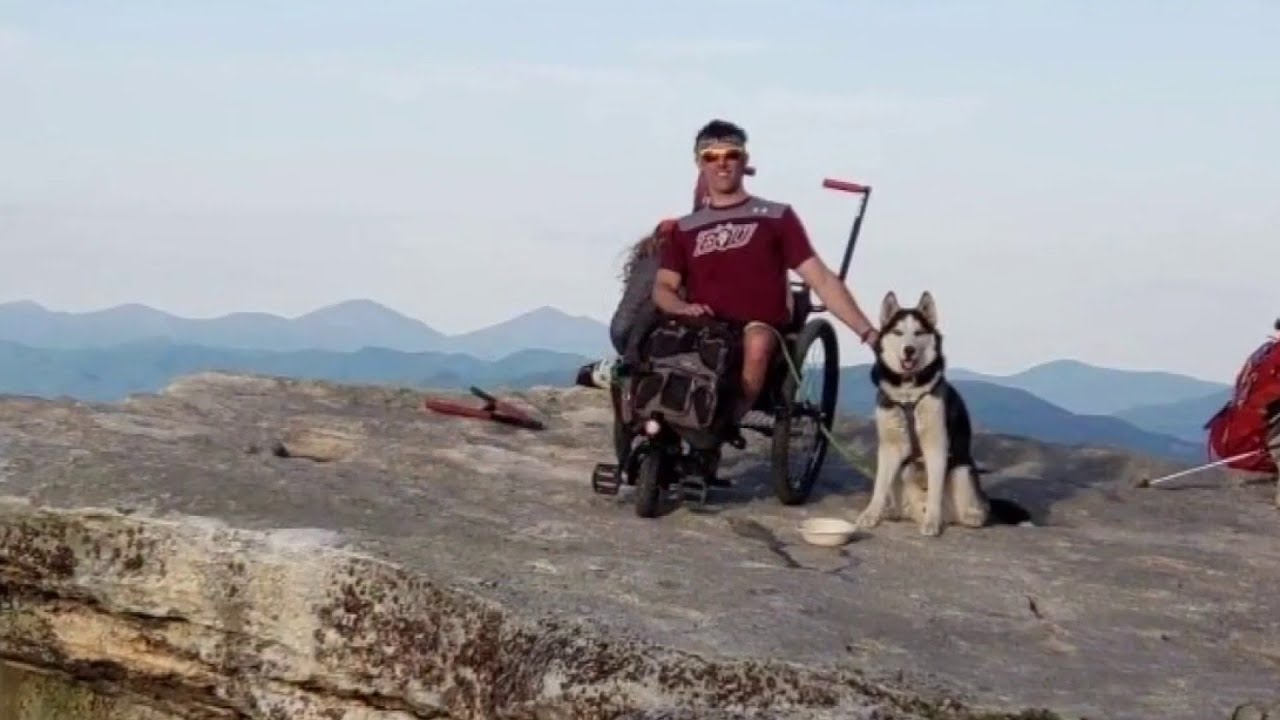 Man reaches top of McAfee's Knob in a wheelchair
