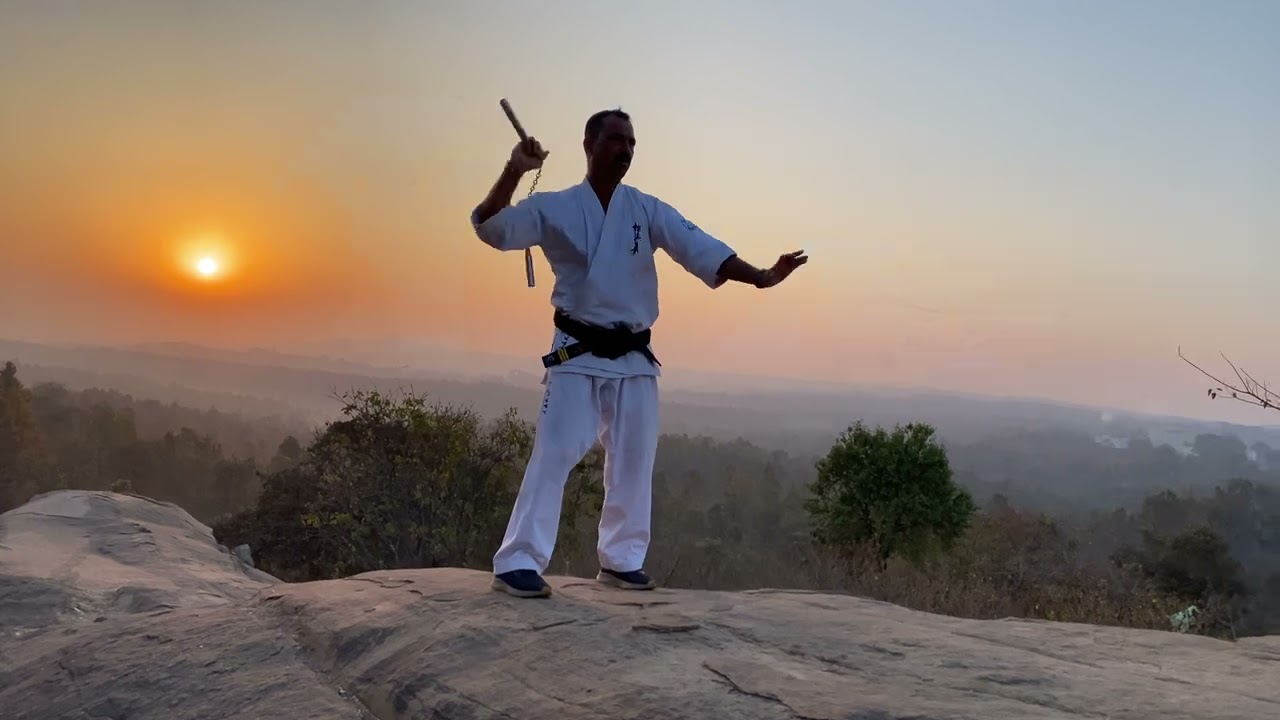 Unleashing the power of discipline and focus, karate fighters clash in a display of speed, strength.