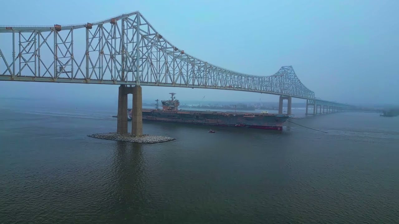 USS John F Kennedy Aircraft Carrier Passing Under the Commodore Barry Bridge (Snowy Drone Footage)