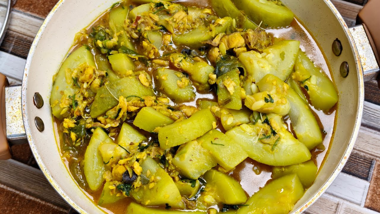 পাঙ্গাস মাছ দিয়ে লাউ রান্না।