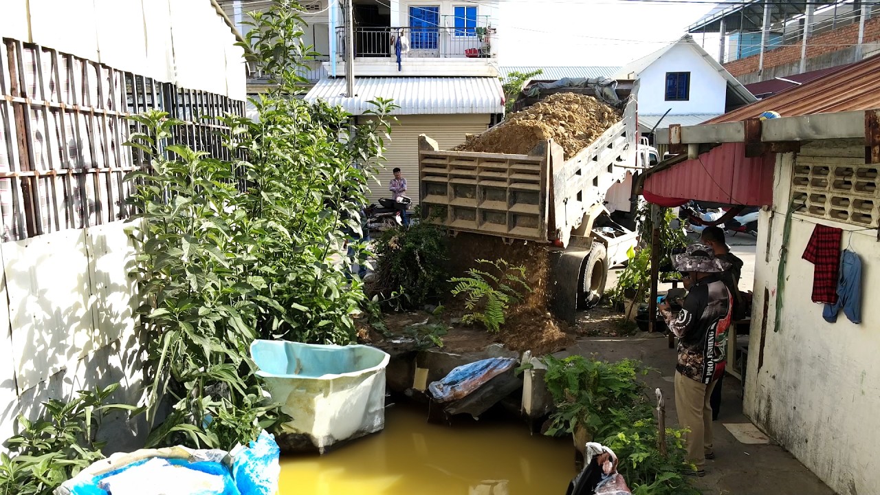 Complete the plan with  rock-filling machine, narrow spaces, flooded areas, garbage, and forests.