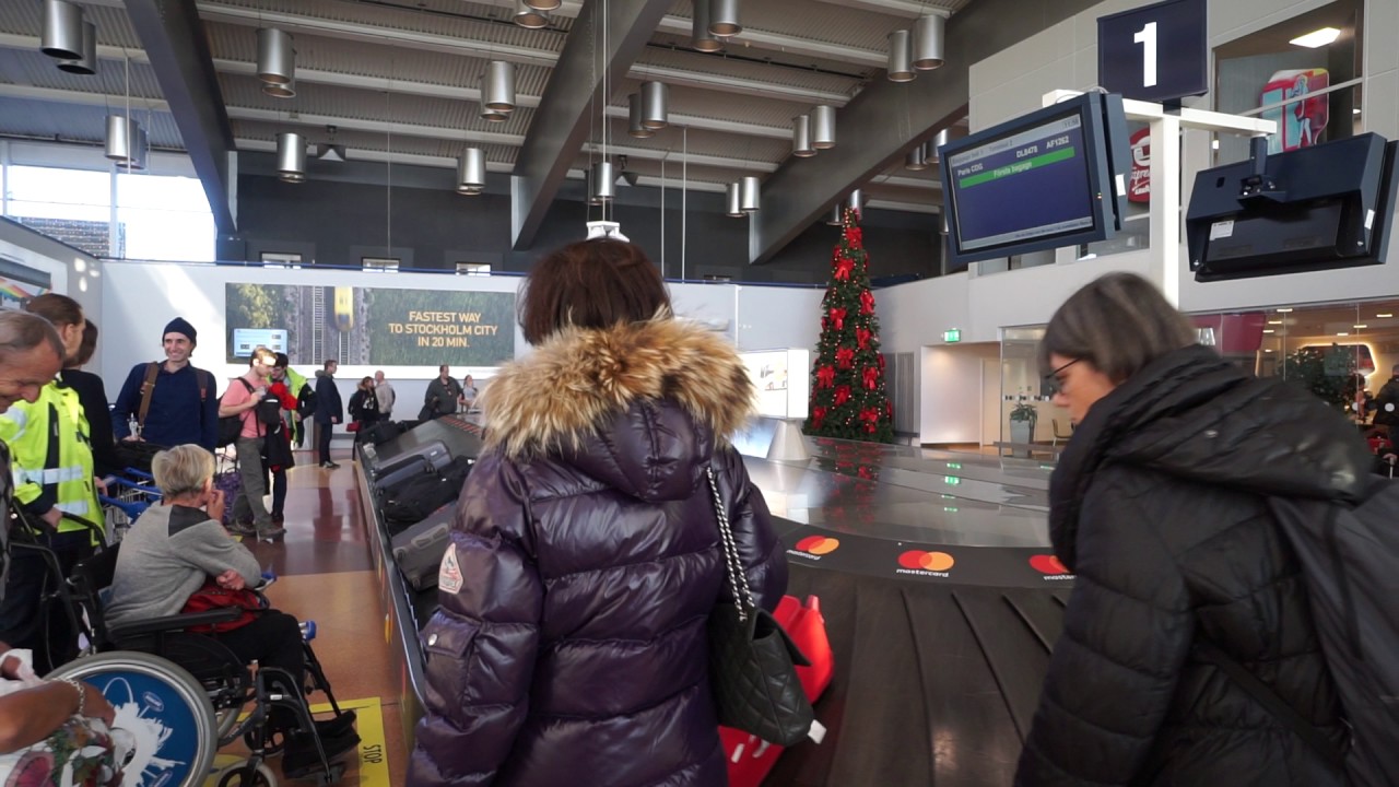 Sweden,  Stockholm, Arlanda airport Terminal 2, walk from airplane to bus stop