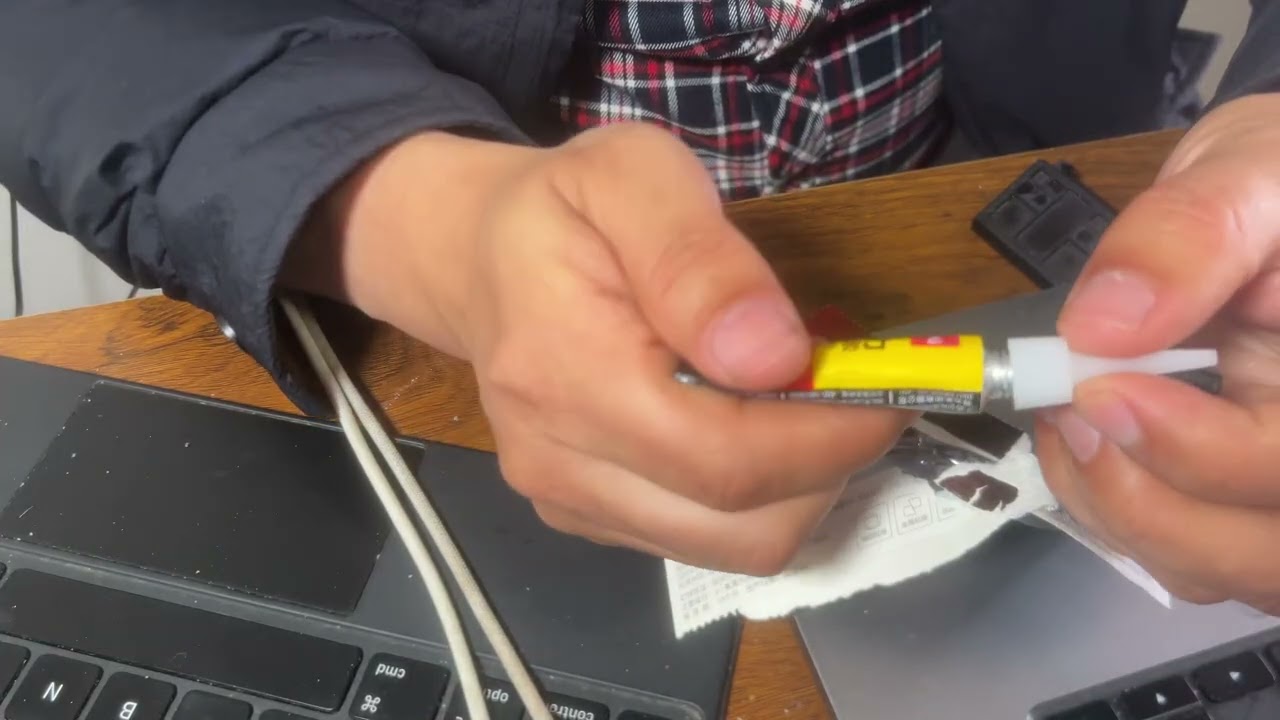 Repairing the cap clip on my DJI nano camera with glue