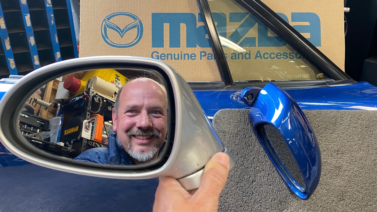 Door mirror removal for 1999-2005 Mazda Miata.