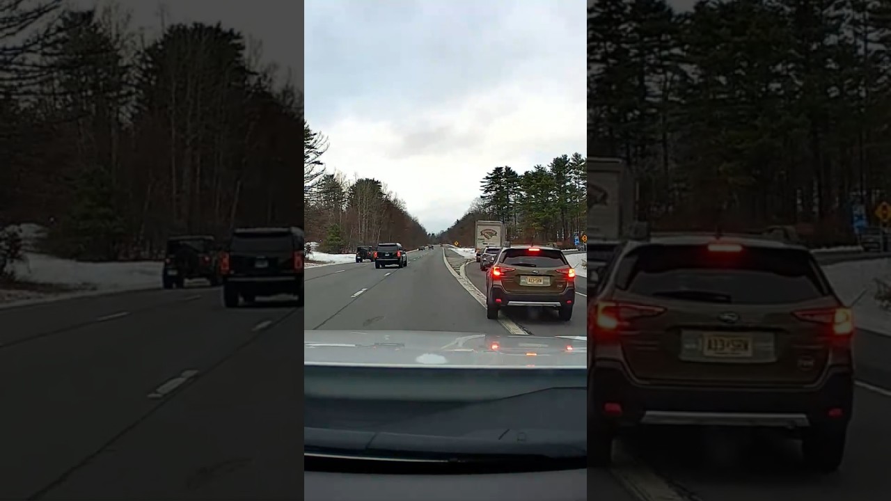 Idiot Driver Stopping on Highway cutting into exit lane