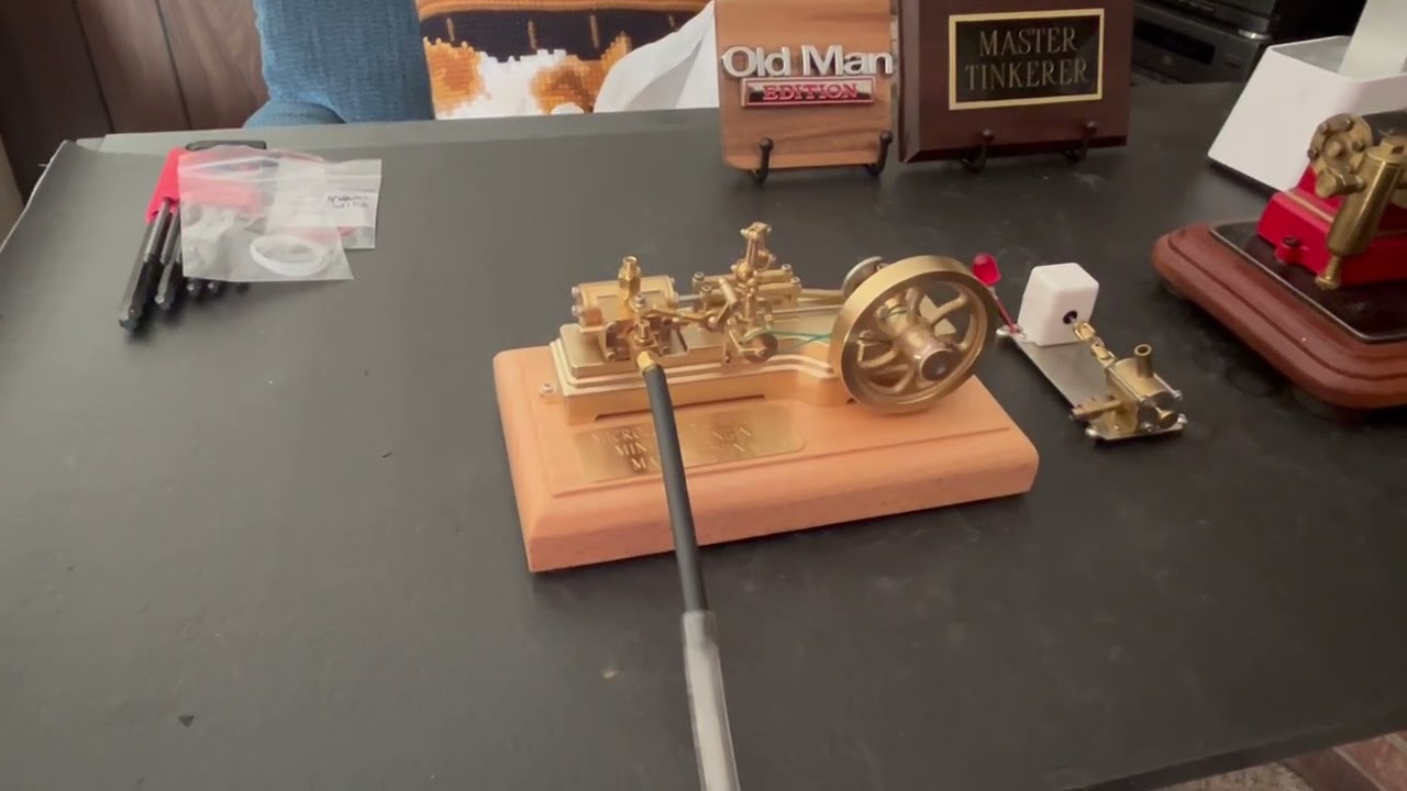 Microcosm S10 mini model mill steam engine driving a mini generator. Made in China. Jan. 23, 2026. 