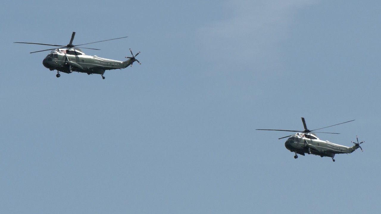 Helicopters fly ahead of President Trump's trip to Europe for NATO summit