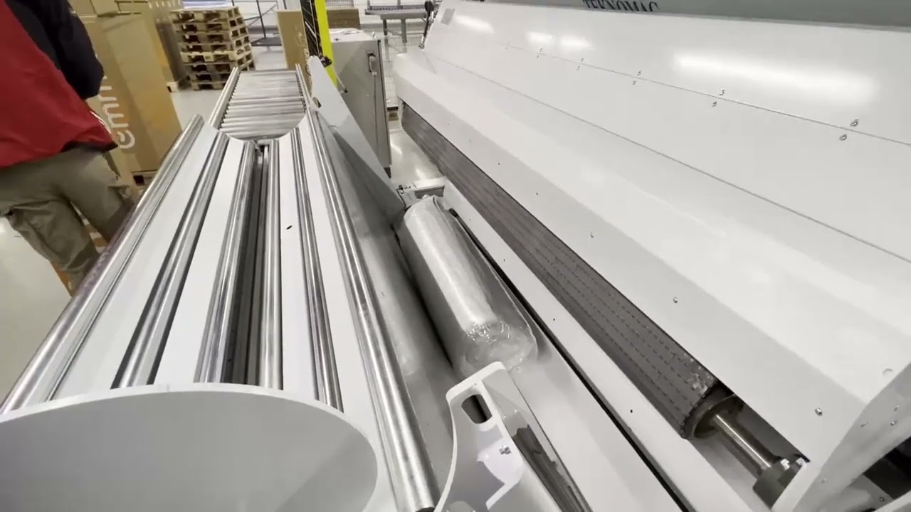 TEKNOMAC www.teknomac.it Automatic Roll-Pack System