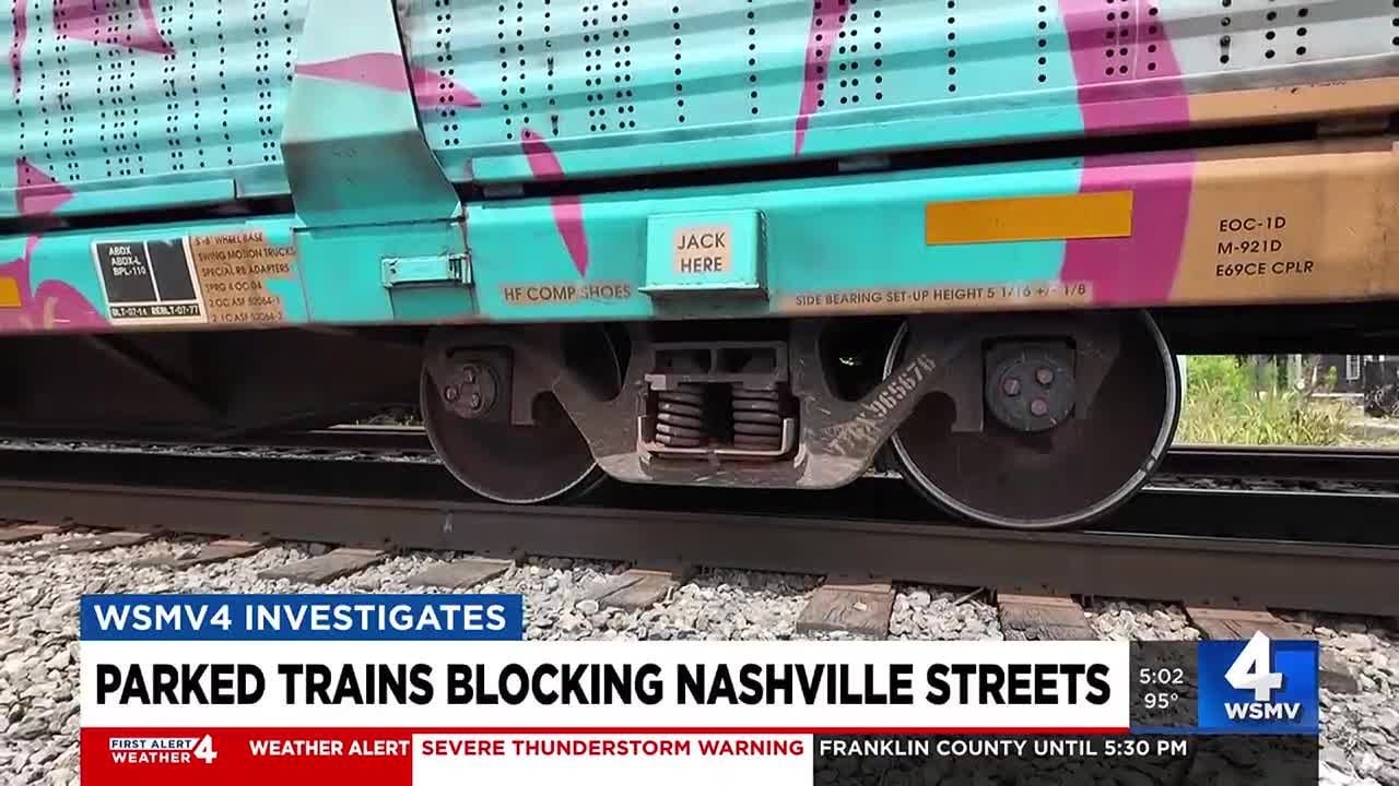 Blocked train crossings trap drivers, force pedestrians to climb through cars