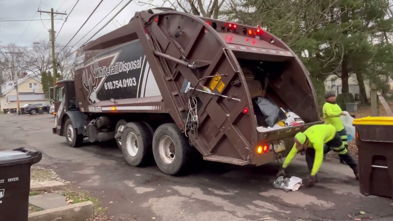 Whitetail Disposal Mack Le Mcneilus rear loader