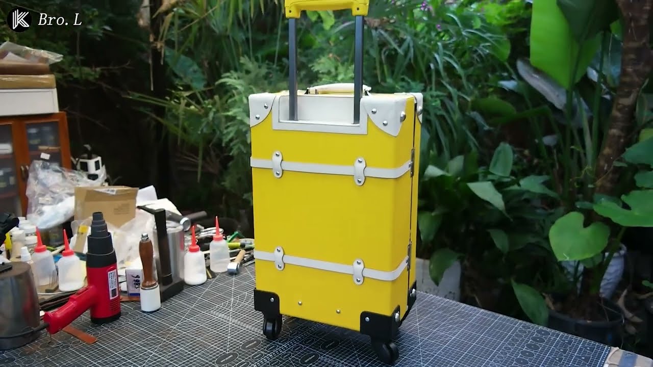 Make a luggage suitcase with leather and wood