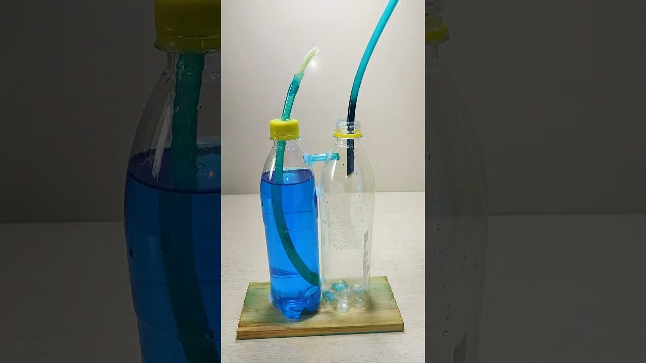 Two water bottles are made by hand, a small science experiment
