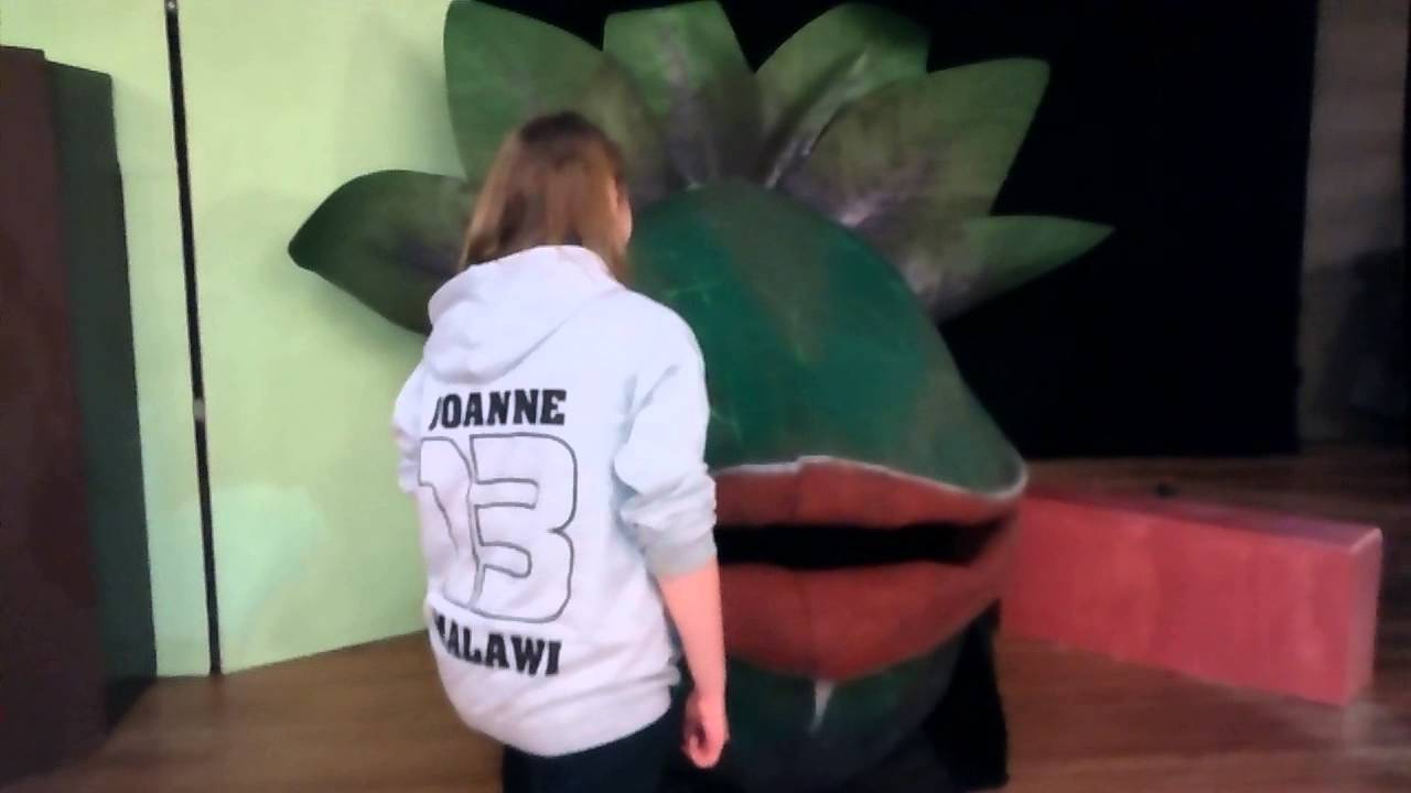 Audrey II eats Joanne
