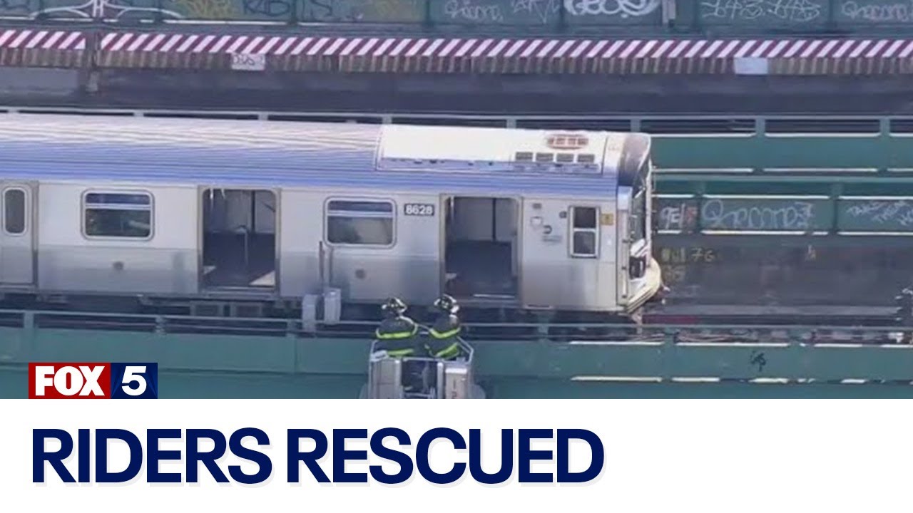 FDNY rescues riders from disabled subway train on elevated track in Queens