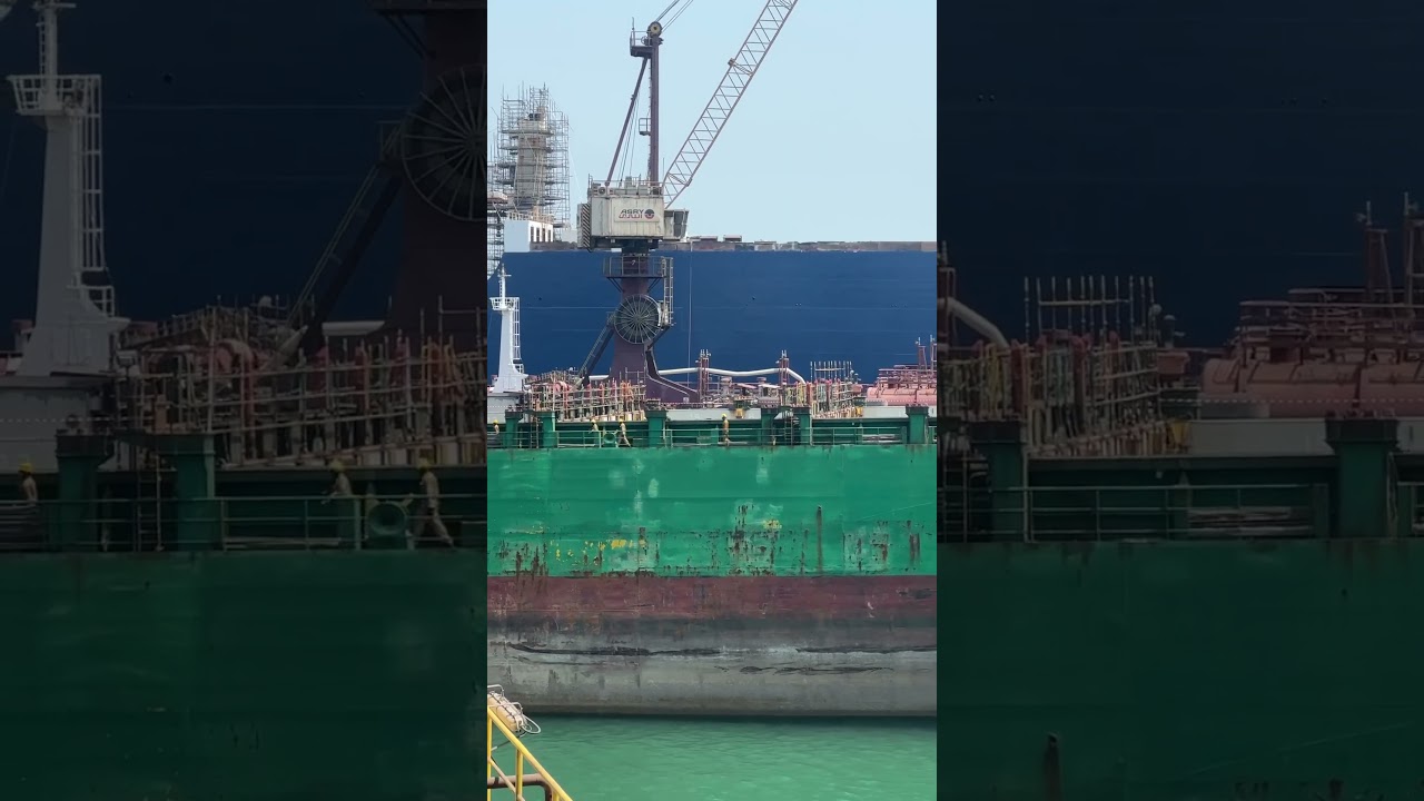 #ship #repair #in #shipyard #manpower #hardwork #crane #move #green #colors