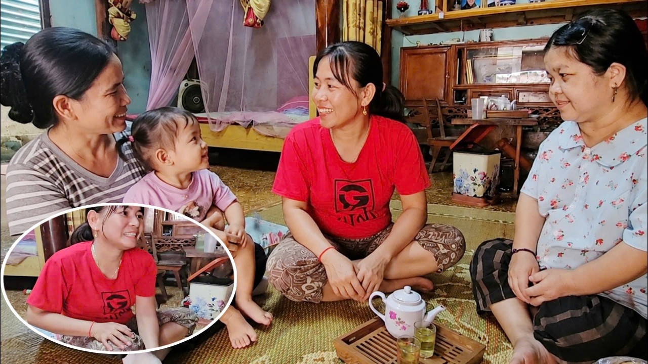 While Hoi was away, his mother happily chatted with her daughter-in-law.