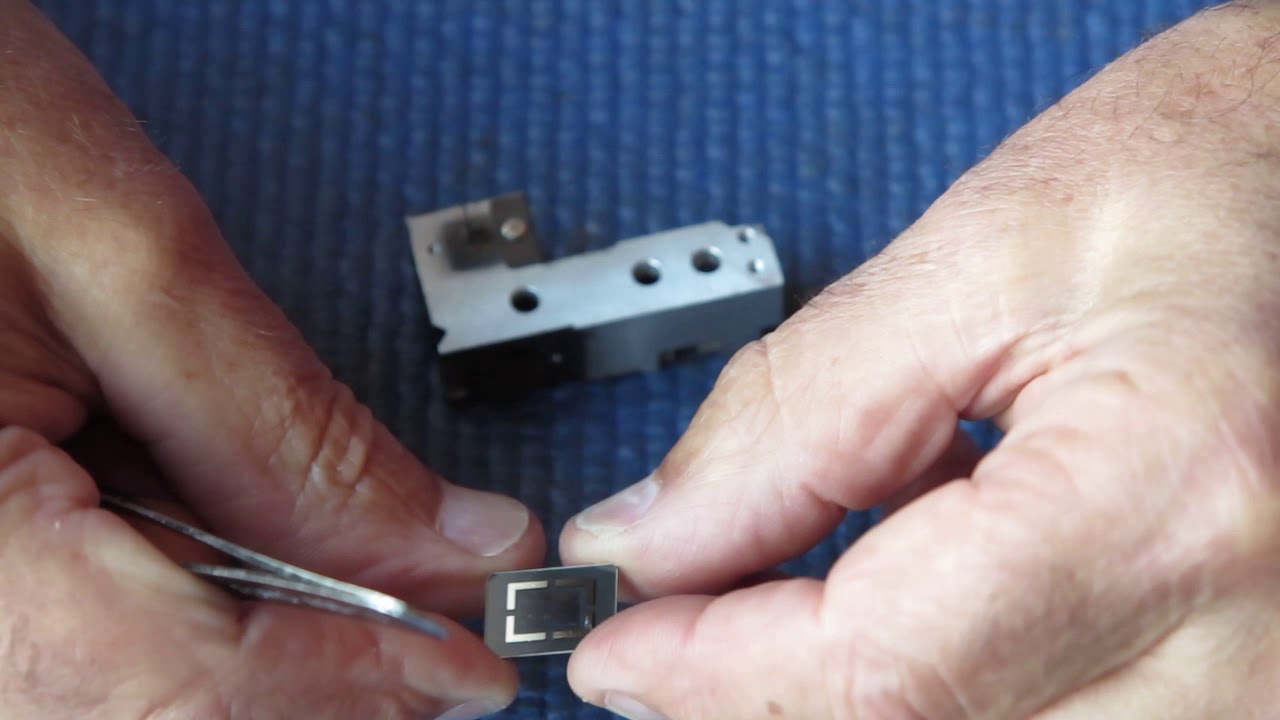 Rangefinder cleaning and adjustment on a Kodak Retina IIIc camera.