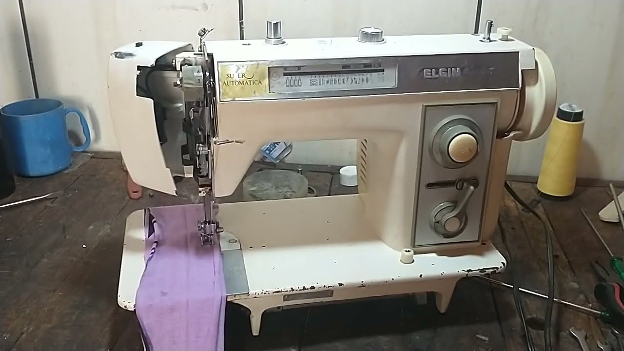 máquina de costura elgin super automática não puxa o tecido